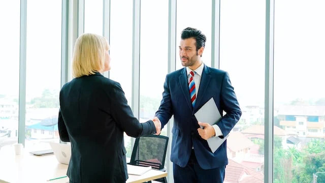 two business people shaking hands